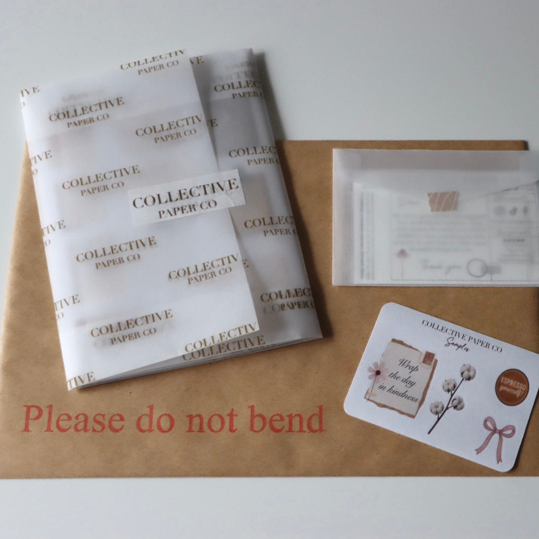 Collective Paper Co sticker sheets wrapped in branded packaging, ready to be shipped via Royal Mail