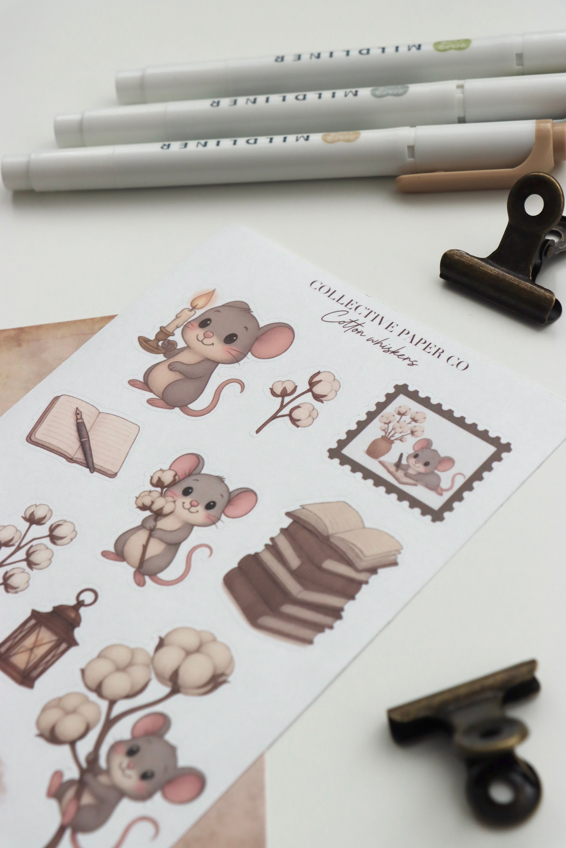 Decorative journaling sheet of kiss-cut stickers of Cotton Whiskers on Japanese washi paper