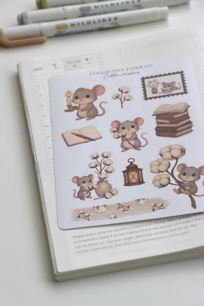Decorative journaling sheet of kiss-cut stickers of Cotton Whiskers on Japanese washi paper