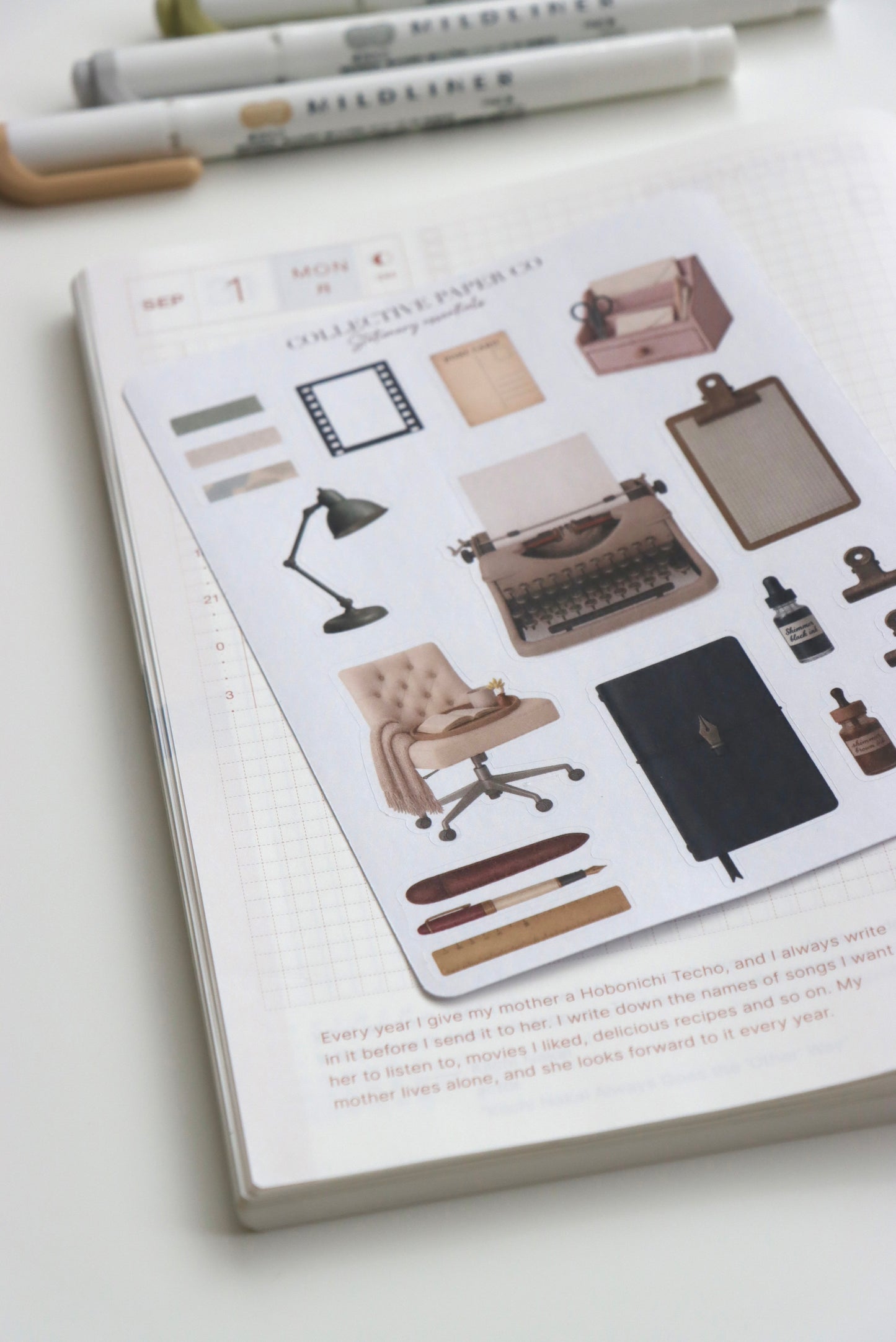 Decorative journaling sheet of kiss-cut vintage and realistic stickers of Stationery essentials on Japanese washi paper